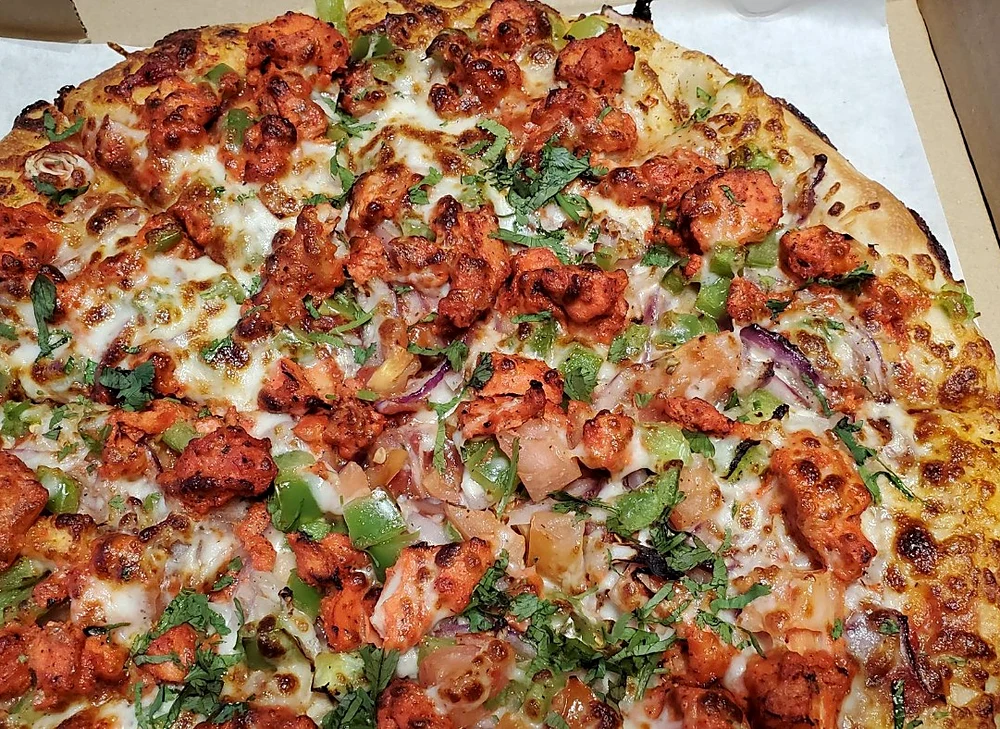 Tandoori chicken pizza at Great Canadian Pizza & Butter Chicken Hut - Macleod, Calgary