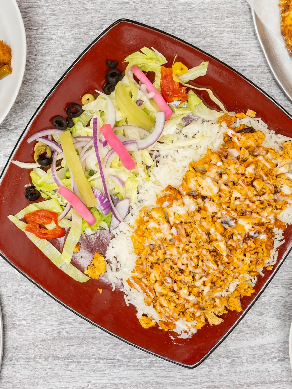 Great Canadian Pizza & Butter Chicken Hut Macleod restaurant in Calgary serving halal pizza and Indian food