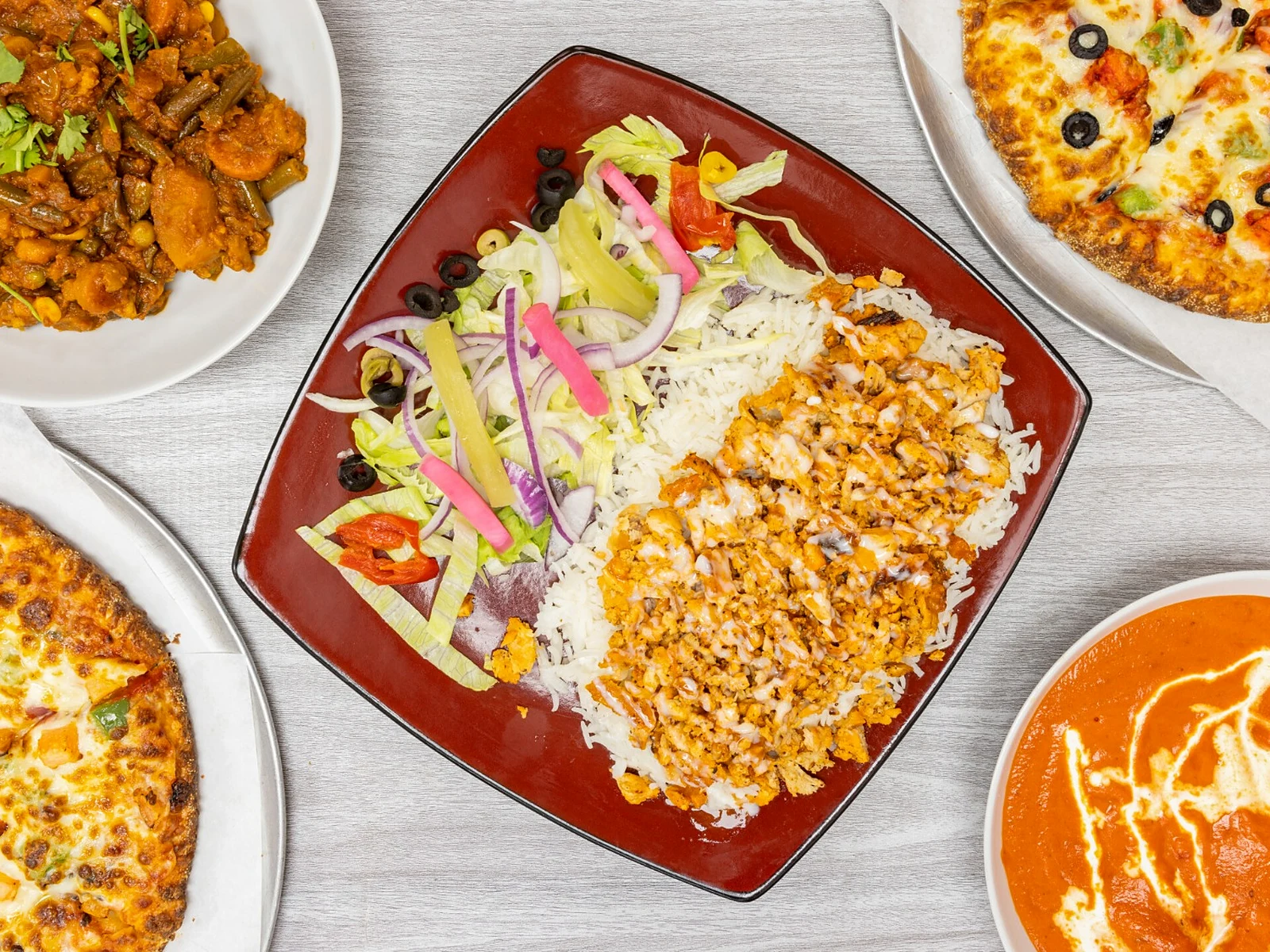 Great Canadian Pizza & Butter Chicken Hut - Macleod serving Marda Loop, Calgary