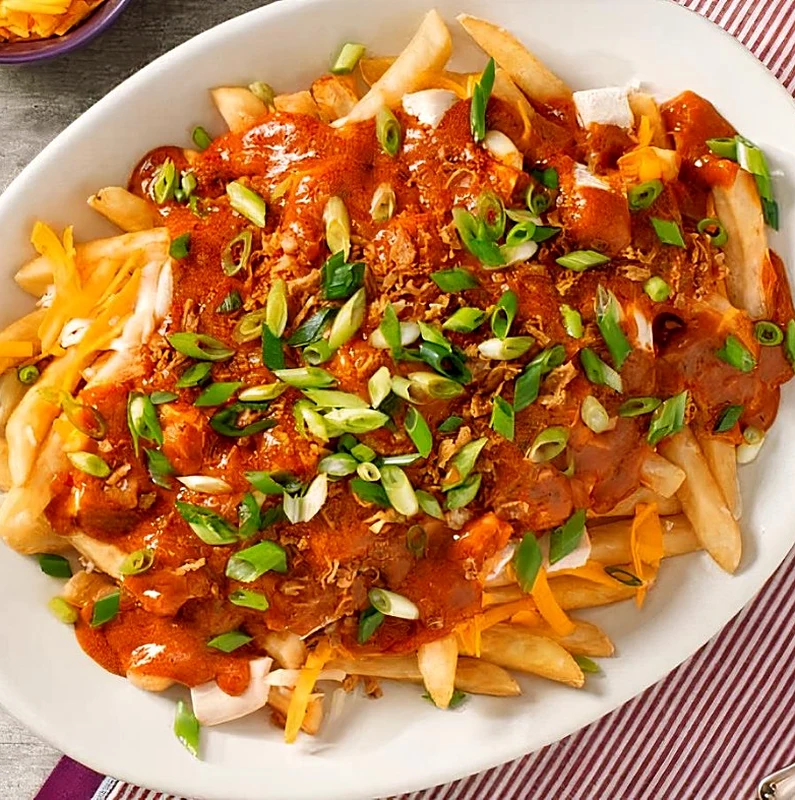 Butter Chicken Poutine at Great Canadian Pizza & Butter Chicken Hut Macleod Trail Calgary