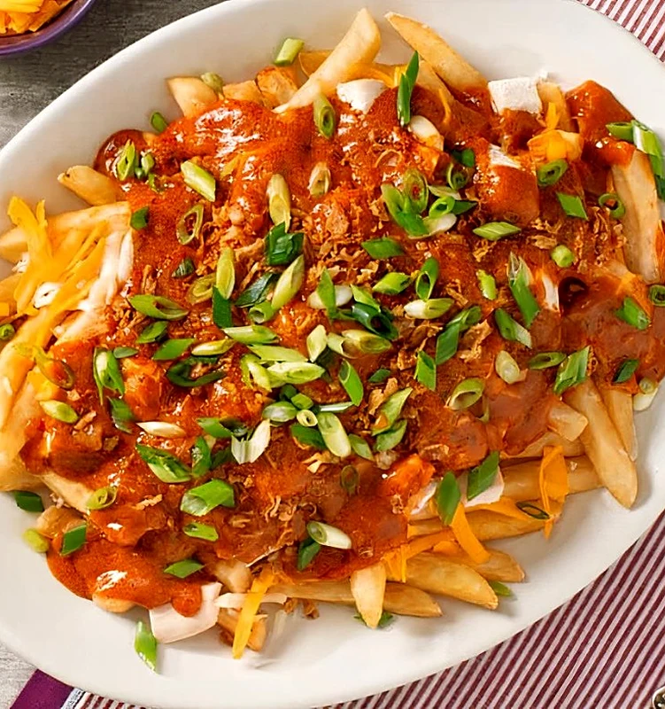 Butter chicken poutine at Great Canadian Pizza & Butter Chicken Hut - Macleod in Calgary