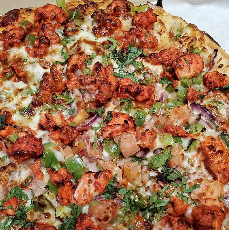 Tandoori chicken pizza at Great Canadian Pizza & Butter Chicken Hut - Macleod Calgary