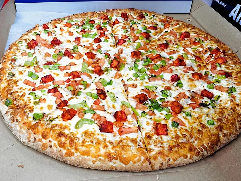 Tandoori Paneer Pizza delivered to Marda Loop from Great Canadian Pizza & Butter Chicken Hut - Macleod